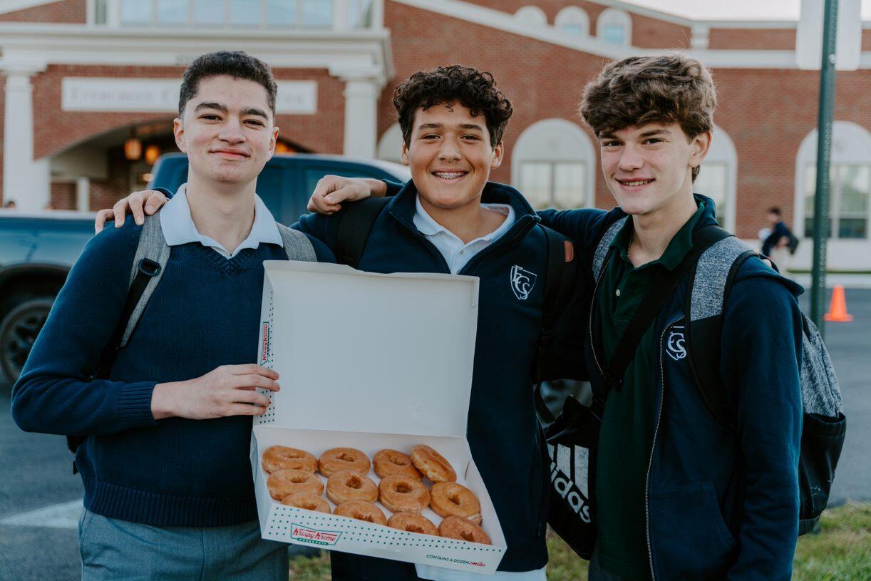 Boys Holding Donuts
